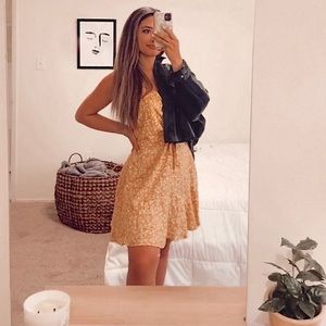 Mustards Colored, knee length dress.